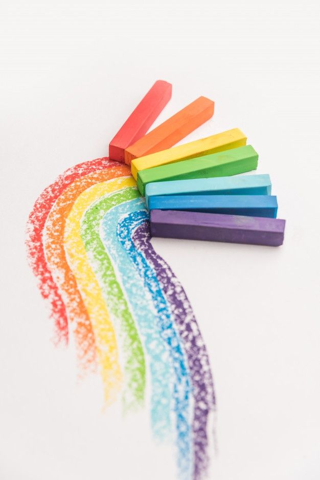 Free Photo | Rainbow gradient made of pastel crayon chalks over the colorful traces